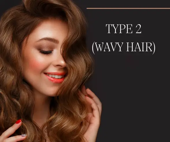 "Type 2 wavy hair with loose S-shaped curls, best styled with lightweight products for added definition and volume."








